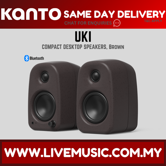 Compact powered desktop speakers in dark brown, front view with twin drivers