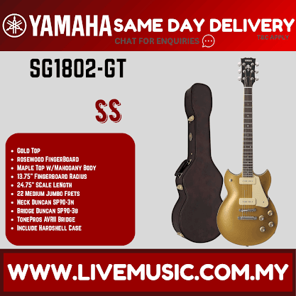 Gold top double-cutaway electric guitar with maple neck and two pickups