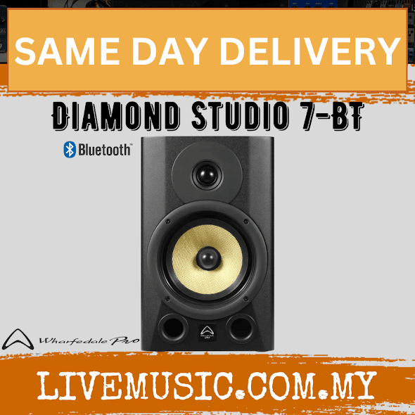 Single black active studio monitor speaker with yellow woofer and front ports