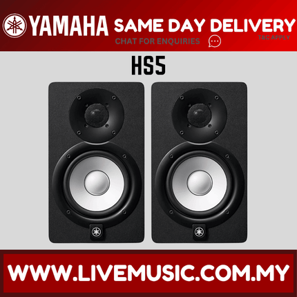 Pair of black powered studio monitor speakers, front view with woofer and tweeter