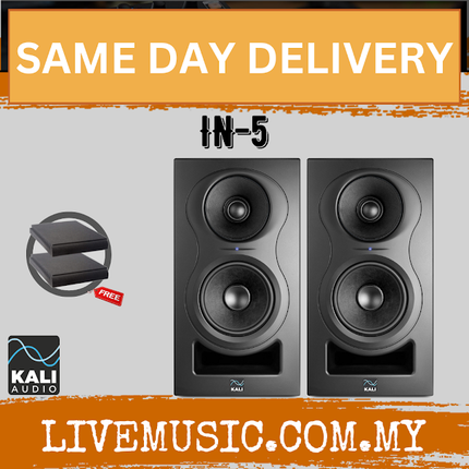 Black powered studio monitor pair with dual drivers and front bass port