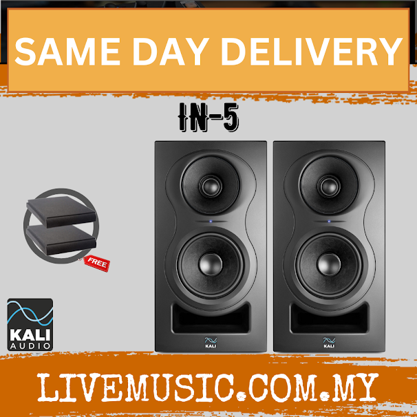 Black powered studio monitor pair with dual drivers and front bass port