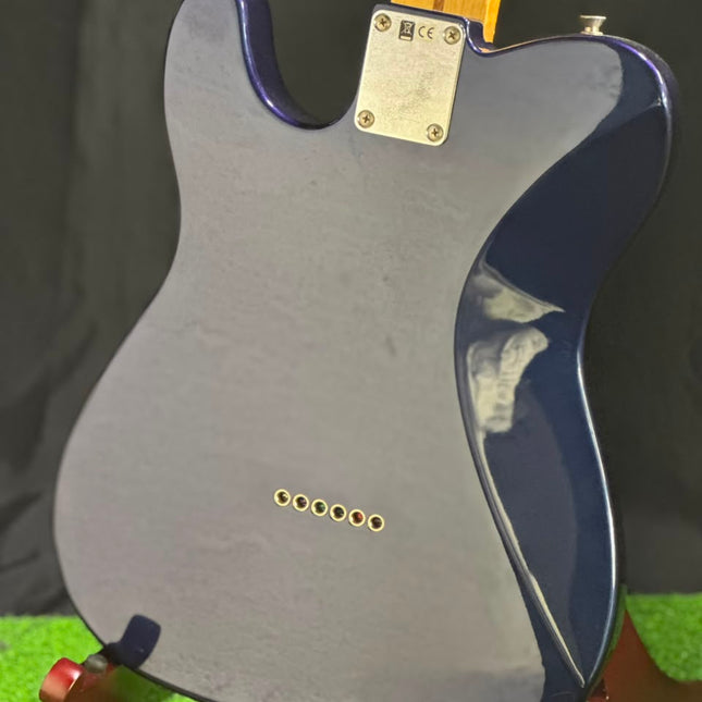 Azure metallic electric guitar body with pickguard, bridge pickup, and control plate