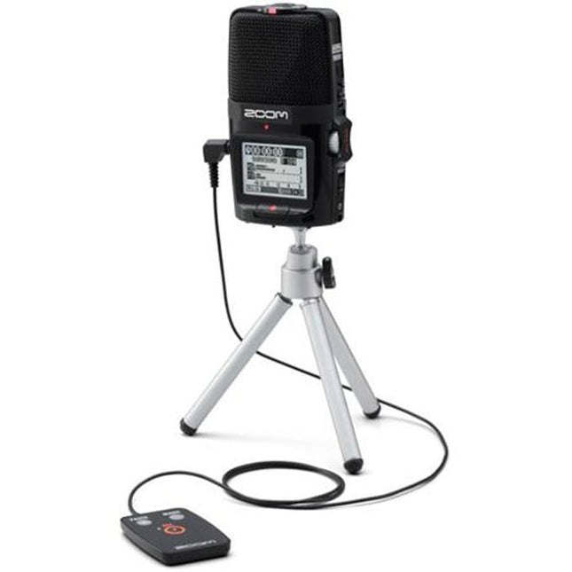 Black Zoom microphone on silver tripod with cables and control module
