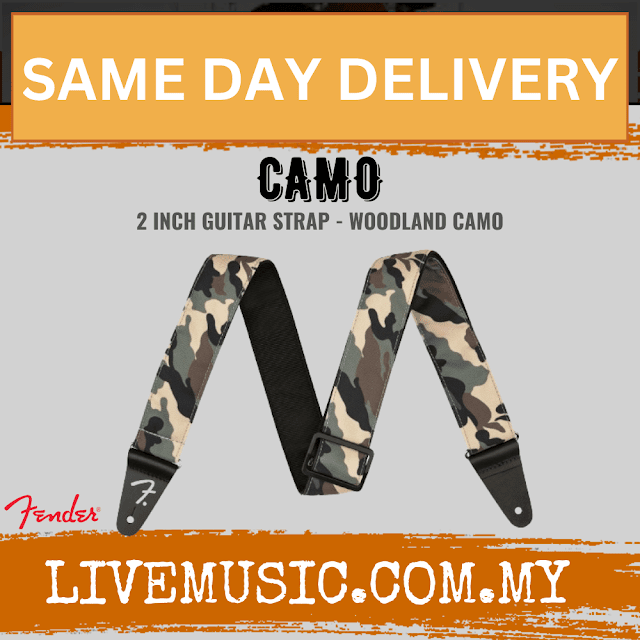 Woodland camo guitar strap with black ends and adjustable buckle