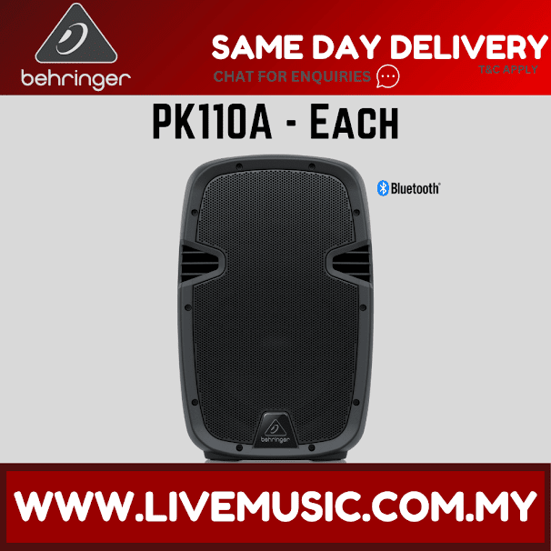 Black 10-inch active PA speaker with front mesh grille and recessed control area
