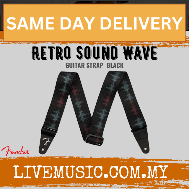 Black guitar strap with retro sound wave pattern and Fender logo ends, adjustable keeper.