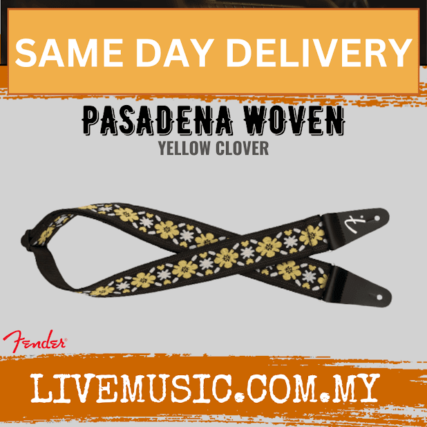 Woven yellow guitar strap with white clover flowers and black leather ends