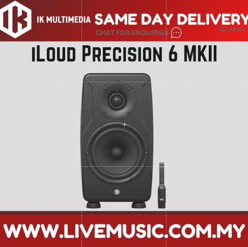 Black 6.5-inch powered studio monitor speaker with front grille and control knobs