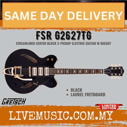 Black Gretsch electric guitar with three pickups and Bigsby-style tremolo, center block