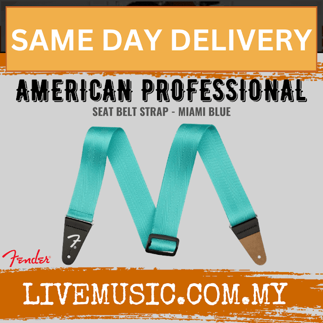 Turquoise 2-inch seat belt guitar strap with black hardware and brown leather ends