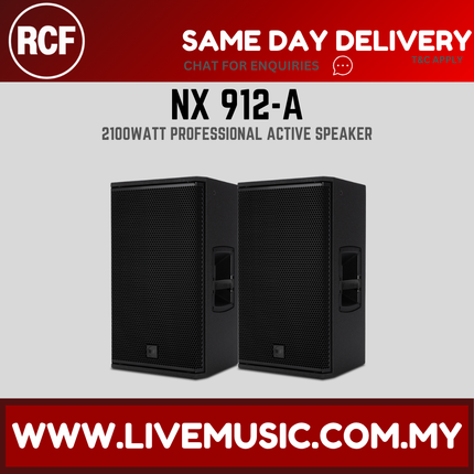 Pair of black active 12-inch speakers with dual front grilles and side handles