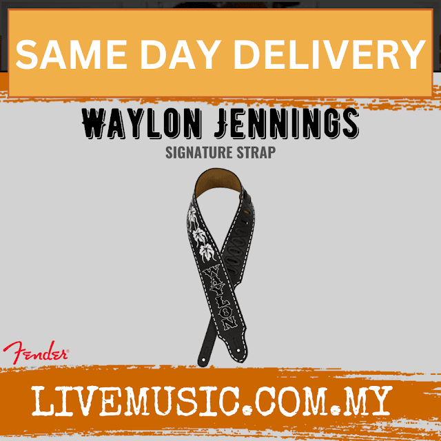 Black Fender Waylon Jennings guitar strap with patterned fabric and stitched ends