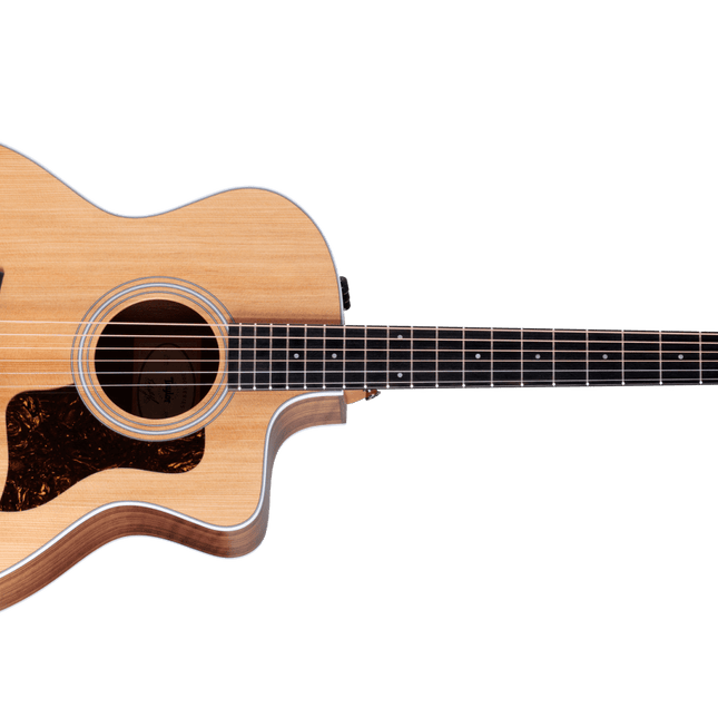Natural acoustic guitar with circular sound hole and black pickguard, grand auditorium