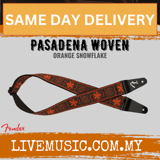 Orange snowflake woven guitar strap with black ends and adjustable leather tab