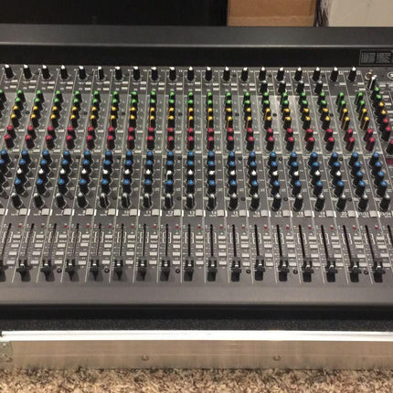 Analog compact mixer mounted in a road case with front controls and channel knobs