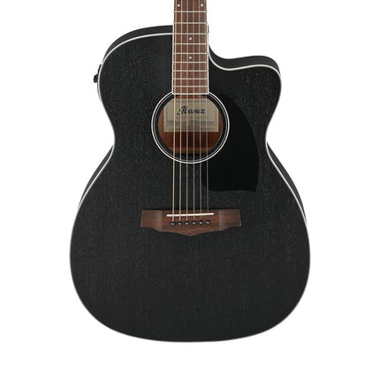 Weathered black acoustic-electric guitar front view with sound hole rosette and bridge