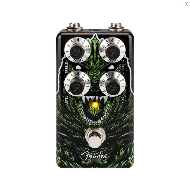 Godzilla distortion guitar effect pedal, black face with green monster artwork and knobs
