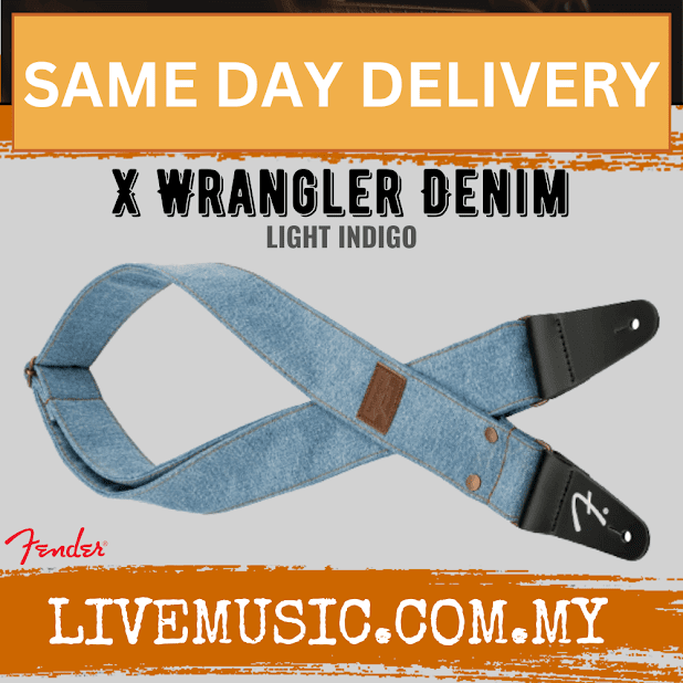 Light indigo denim Fender X Wrangler guitar strap with black ends and leather keeper