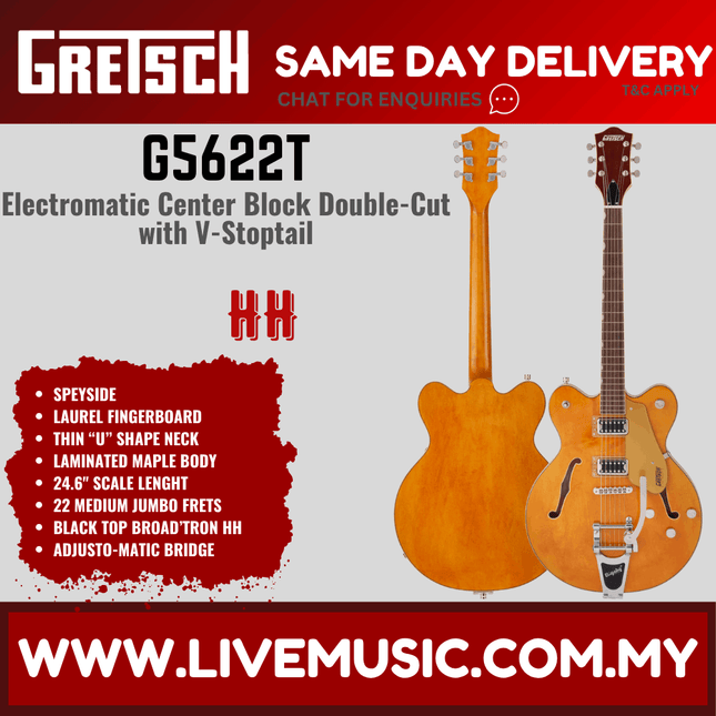 Amber double-cut electric guitar with Bigsby-style tremolo and center block