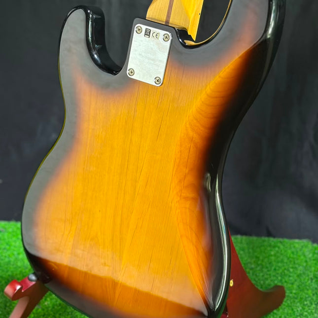 Fender Precision Bass guitar, 2-tone sunburst body, maple fretboard.