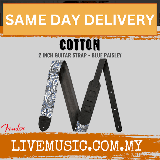 Cotton guitar strap with blue paisley pattern, black ends, and adjustable holes.