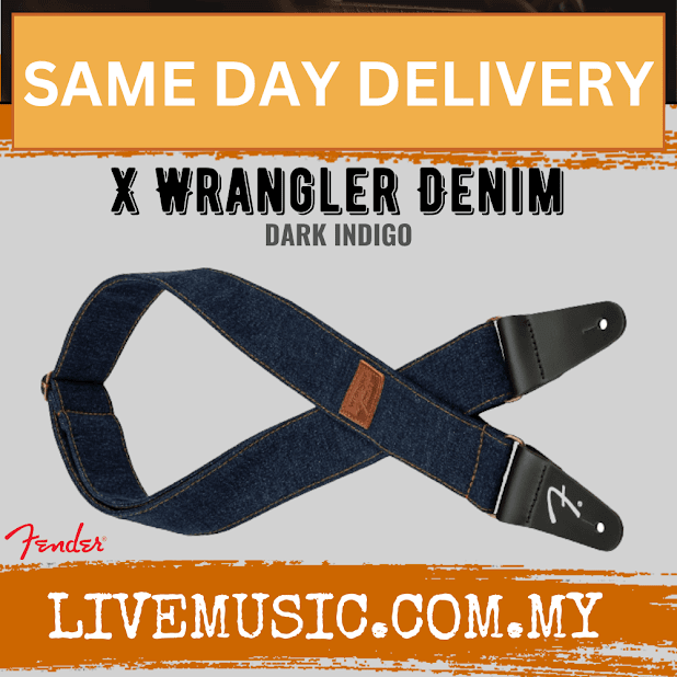 Dark indigo denim guitar strap with black leather ends and snap buttons