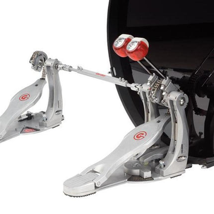 Direct drive double bass drum pedal with two footboards attached to a bass drum