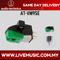 Green dual moving magnet turntable cartridge with black body and connector pins