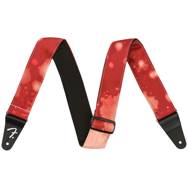Fender red tie-dye acid wash guitar strap with black ends and center buckle